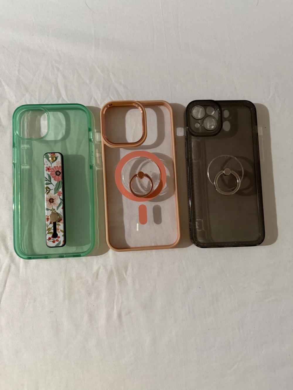 Bundle of 3 iPhone 14+/15+ neutral phone cases with coordinating ring holders